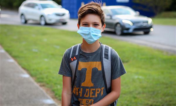 student smiles on first day of school